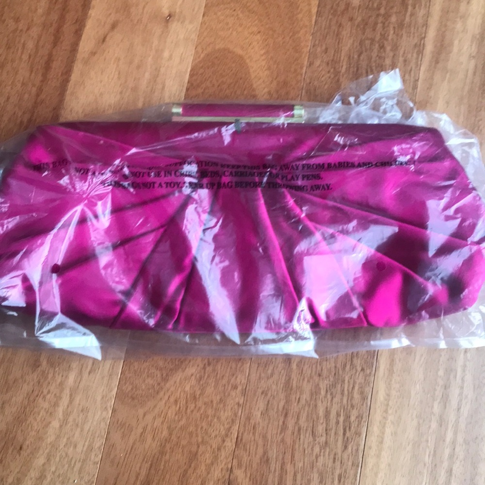 Fuschia clutch.